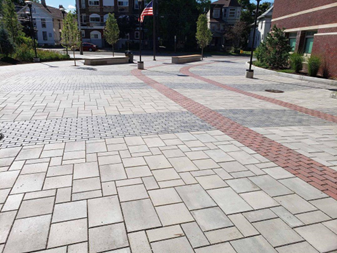 A picture containing outdoor, ground, brick, sidewalk
Description automatically generated